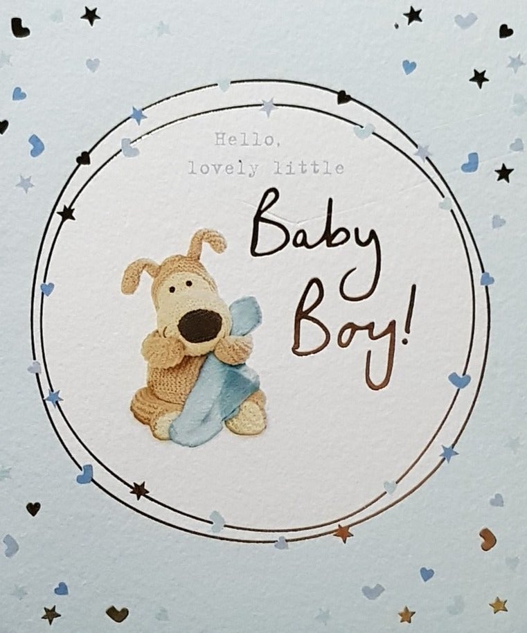 New Baby Card - Boy / Cute Dog Holding Blue Blanket Sitting In A White Circle