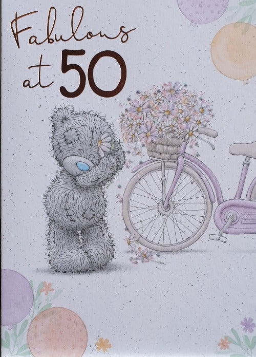 Age 50 Birthday Card - Teddy Holding A Pink Flower & A Flower Basket On A Bicycle