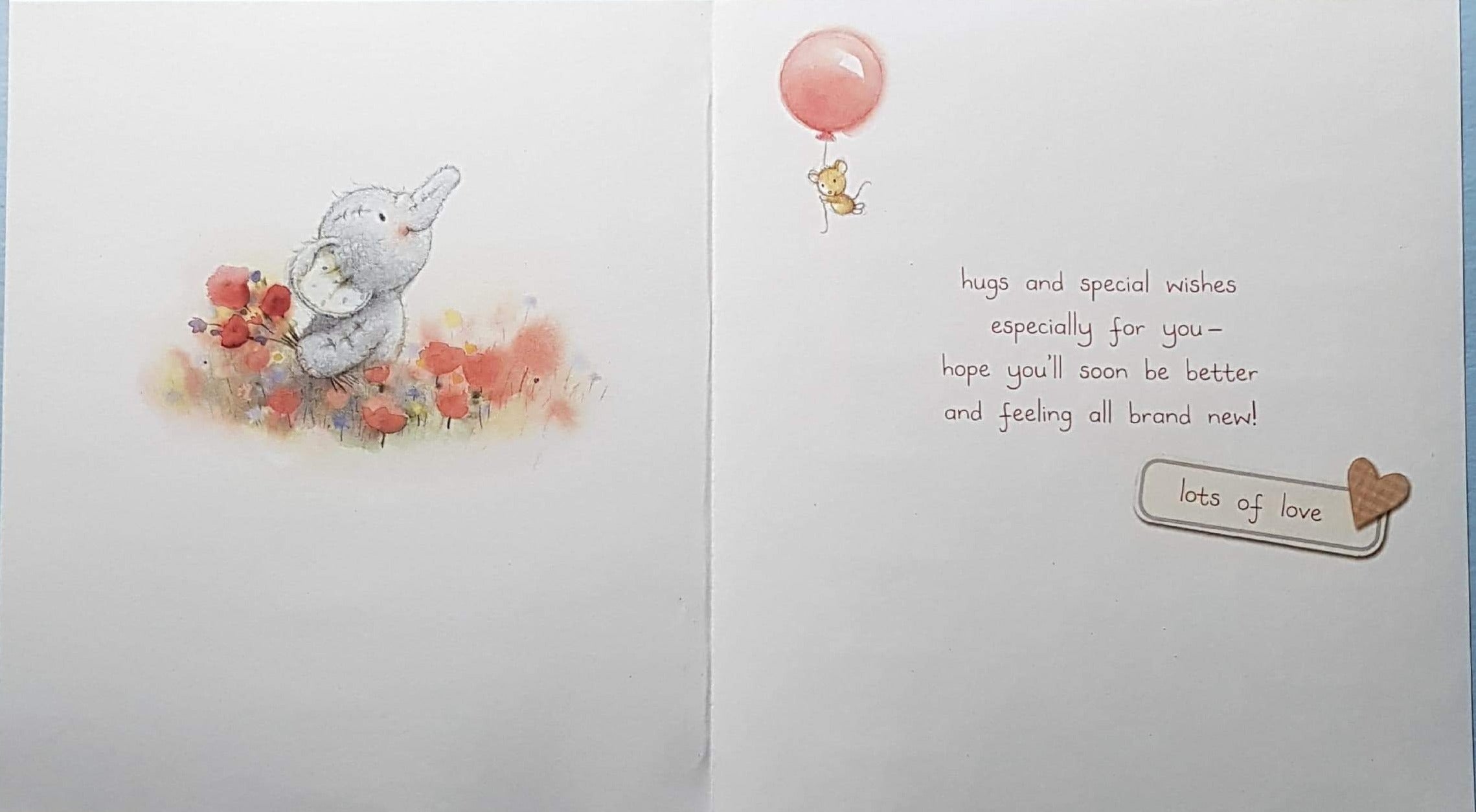 Get Well Card - Elephant In A White Circle Labeled 'With Love And Hugs'