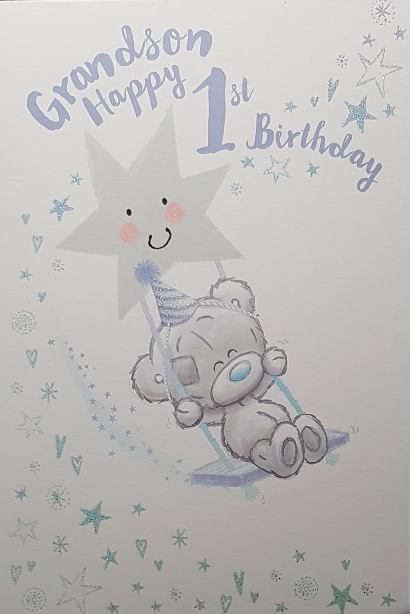 Age 1 Birthday Card - Grandson / Teddy In A Blue Hat Swinging & A Happy Star