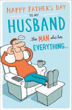 Fathers Day Card - Husband / A Man In Orange Top Relaxing On A Sofa