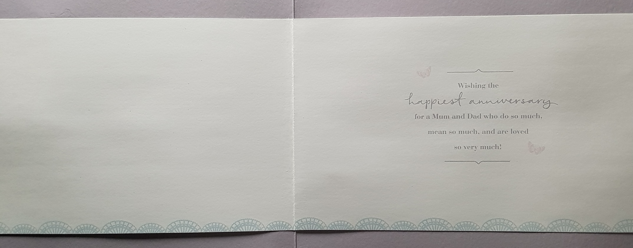 Anniversary Card - Mum & Dad / A Sparkly Gold Font Surrounded By Colourful Flowers